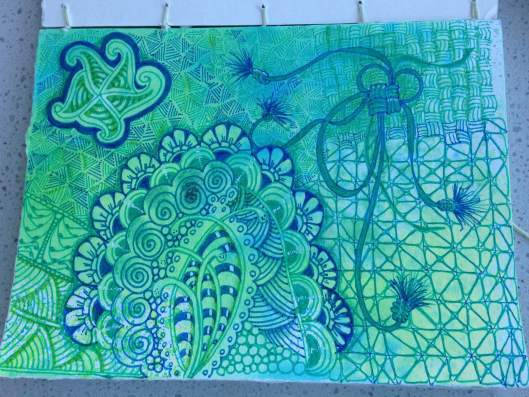 Water color background - used blue and green Micron pens and shaded with colored pencils. This is in a 4.5X6 book I made with water color paper.
